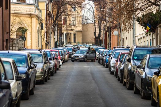 Car traffic at rush hour in downtown area of the city. Car pollution, traffic jam in the morning and evening in the capital city of Bucharest, Romania, 2020