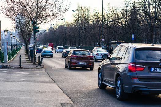 Car traffic at rush hour in downtown area of the city. Car pollution, traffic jam in the morning and evening in the capital city of Bucharest, Romania, 2020