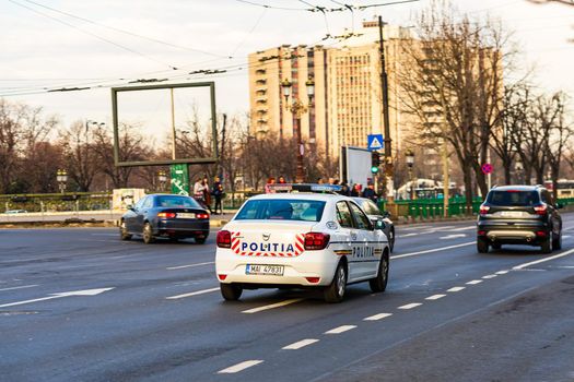 Car traffic at rush hour in downtown area of the city. Car pollution, traffic jam in the morning and evening in the capital city of Bucharest, Romania, 2021