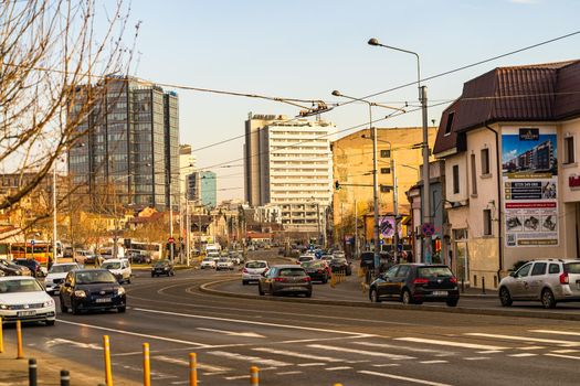 Car traffic at rush hour in downtown area of the city. Car pollution, traffic jam in the morning and evening in the capital city of Bucharest, Romania, 2020