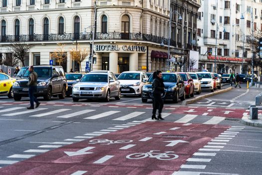 Car traffic at rush hour in downtown area of the city. Car pollution, traffic jam in the morning and evening in the capital city of Bucharest, Romania, 2021