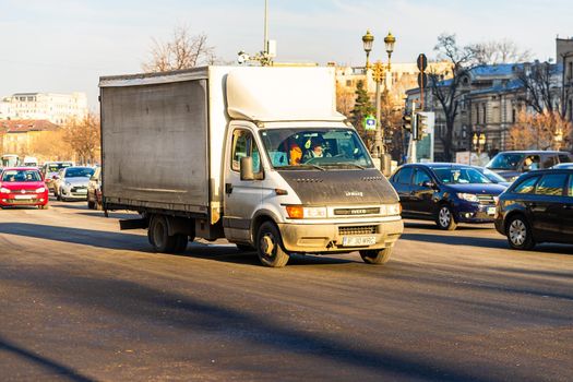 Car traffic at rush hour in downtown area of the city. Car pollution, traffic jam in the morning and evening in the capital city of Bucharest, Romania, 2021