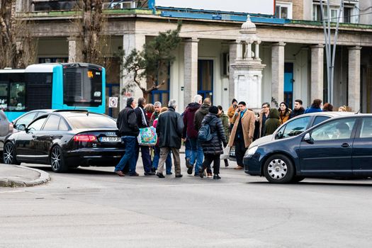 Car traffic at rush hour in downtown area of the city. Car pollution, traffic jam in the morning and evening in the capital city of Bucharest, Romania, 2021