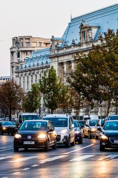 Car traffic at rush hour in downtown area of the city. Car pollution, traffic jam in the morning and evening in the capital city of Bucharest, Romania, 2021