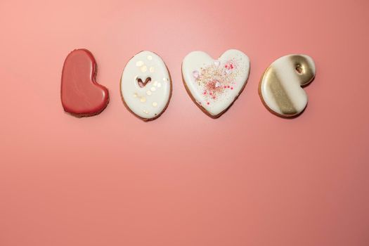 the word love is laid out from ginger cookies. High quality photo