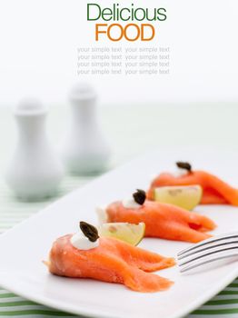 Smoked salmon roll with cream cheese.