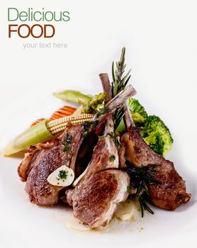 Roasted Lamb Chops with Vegetables and Basil.