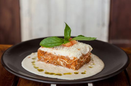 Lasagna with meat and spinach.