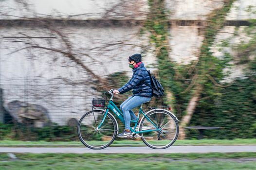 terni,italy february 24 2021:oanning of man on bicycle at the park