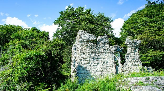 Natural landscape with ruins on the background of trees. Seraya Baba, Abkhazia