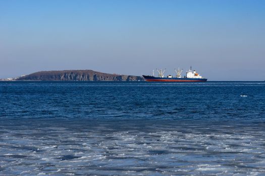 Ship cargo ship on the background of the seascape. Vladivostok, Russia
