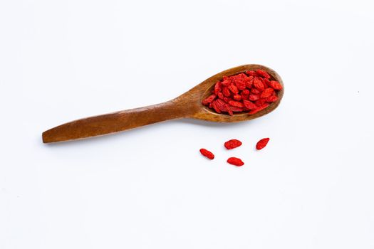 Dried goji berries on white background. Top view