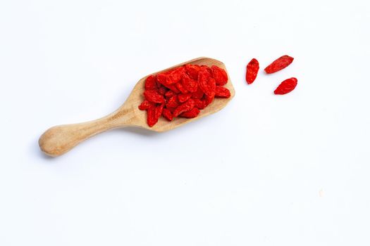 Dried goji berries on white background. Top view