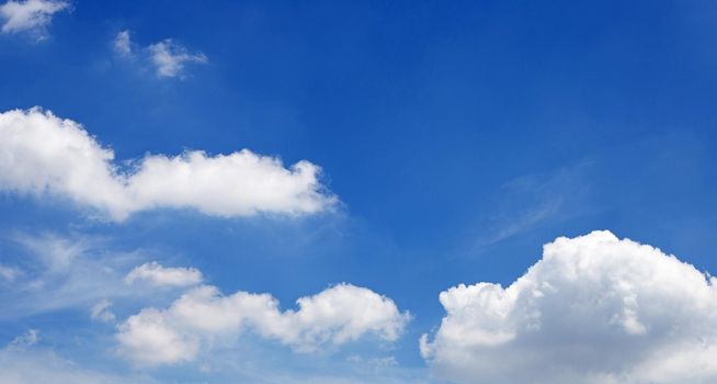Blue sky background with cloud. Copy space