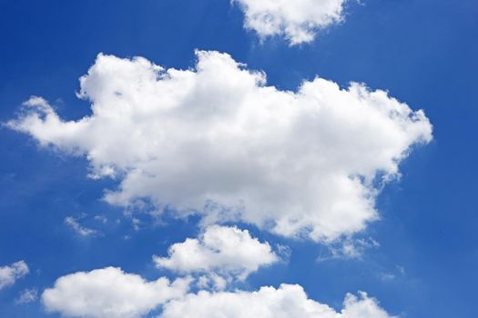 Blue sky background with cloud. Copy space
