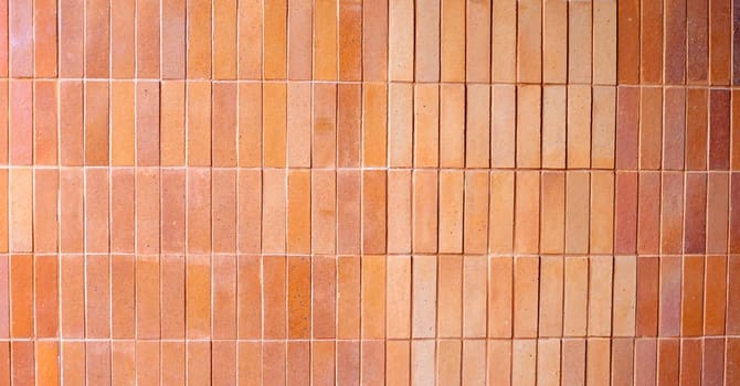 Yellow brown brick wall for background.