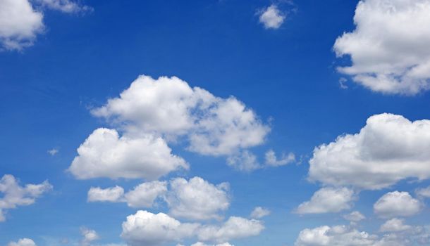 Blue sky background with cloud. Copy space