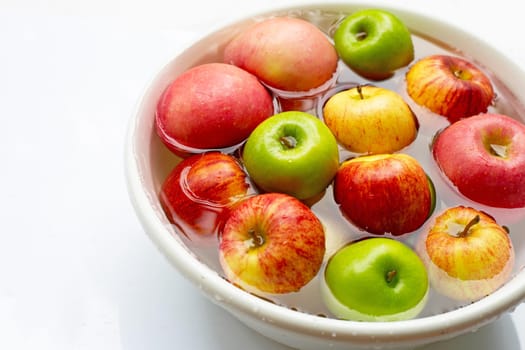 Washing fresh apples in the water