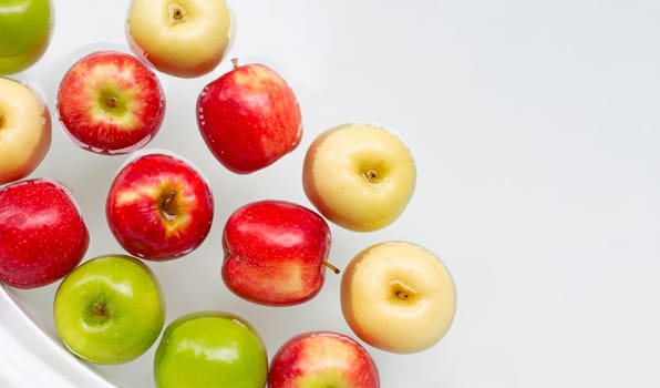 Washing fresh apples in the water