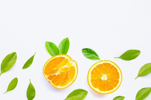 High vitamin C, JFresh orange fruit with green leaves  on white background.