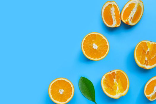 High vitamin C, Juicy and sweet. Fresh orange fruit  on blue background. Top view