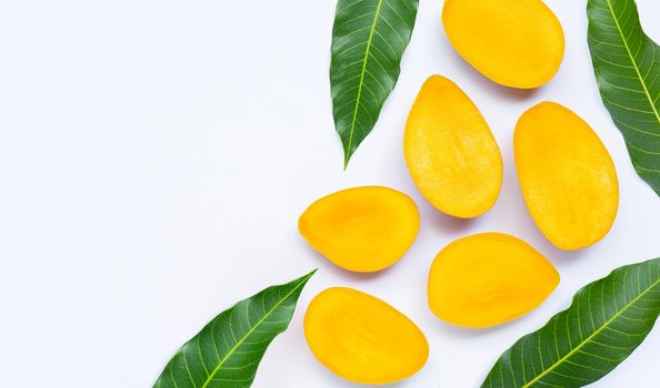 Tropical fruit, Mango with leaves on white background. Top view