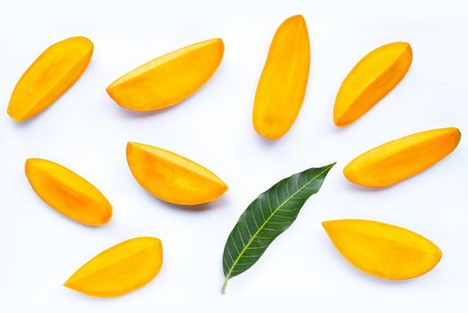 Tropical fruit, Mango slices on white background. Top view