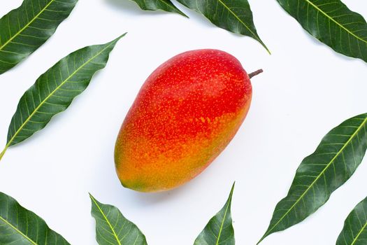 Tropical fruit, Mango with leaves on white background. Top view