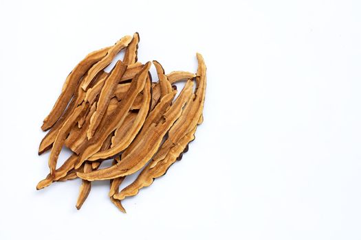 Dried lingzhi mushroom slices on white background. Copy space
