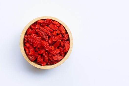 Dried goji berries on white background. Top view