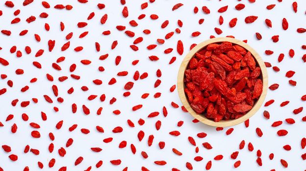 Dried goji berries on white background.