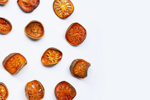 Dried bael fruit on white background. Top view