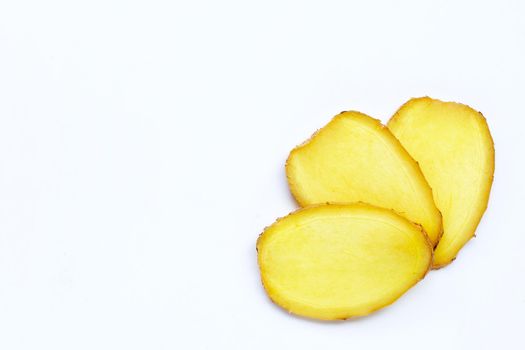 Ginger slices on white background. Copy space