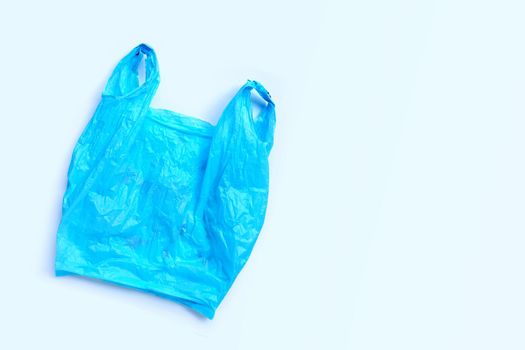 Colorful plastic bags on white background. Copy space