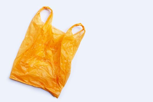 Colorful plastic bags on white background. Copy space