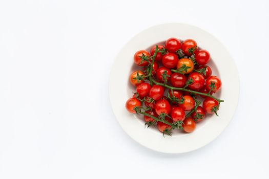 Fresh tomatoes on white background.