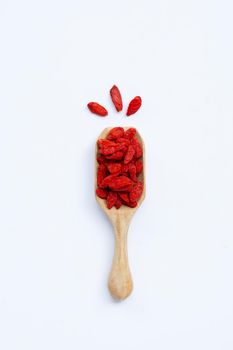 Dried goji berries on white background. Top view