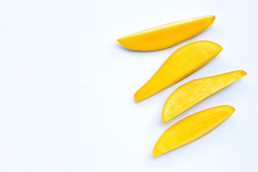Tropical fruit, Mango slices on white background. Top view