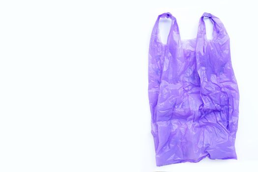 Colorful plastic bags on white background. Copy space