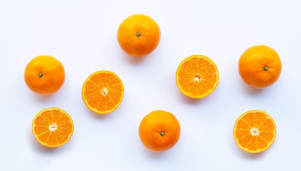 Fresh orange citrus fruit on white background.