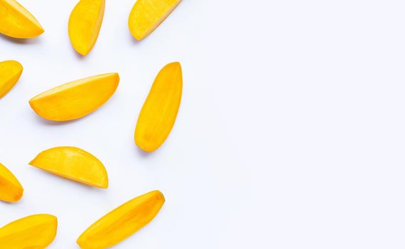 Tropical fruit, Mango slices on white background. Top view