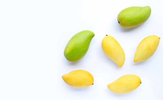 Top view of mango on white background. Copy space