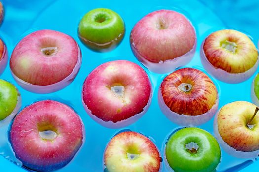 Washing fresh apples in the water