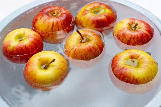 Washing fresh apples in the water