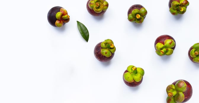 Mangosteen on white background. Top view