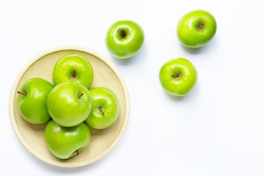 Green apples on white background. Copy space