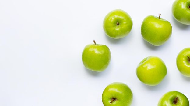 Green apples on white background. Copy space