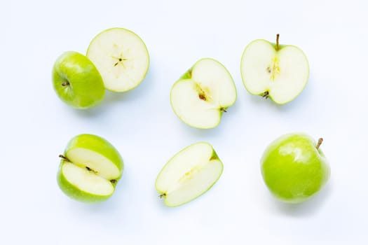 Green apples on white background. Top view