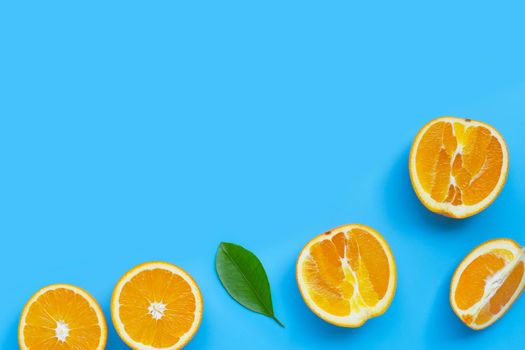 High vitamin C, Juicy and sweet. Fresh orange fruit  on blue background. Top view