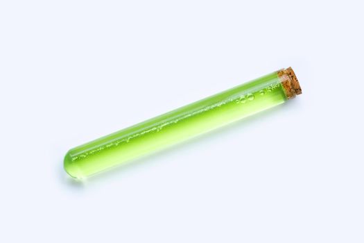 Aloe vera gel in glass tube on a white background.